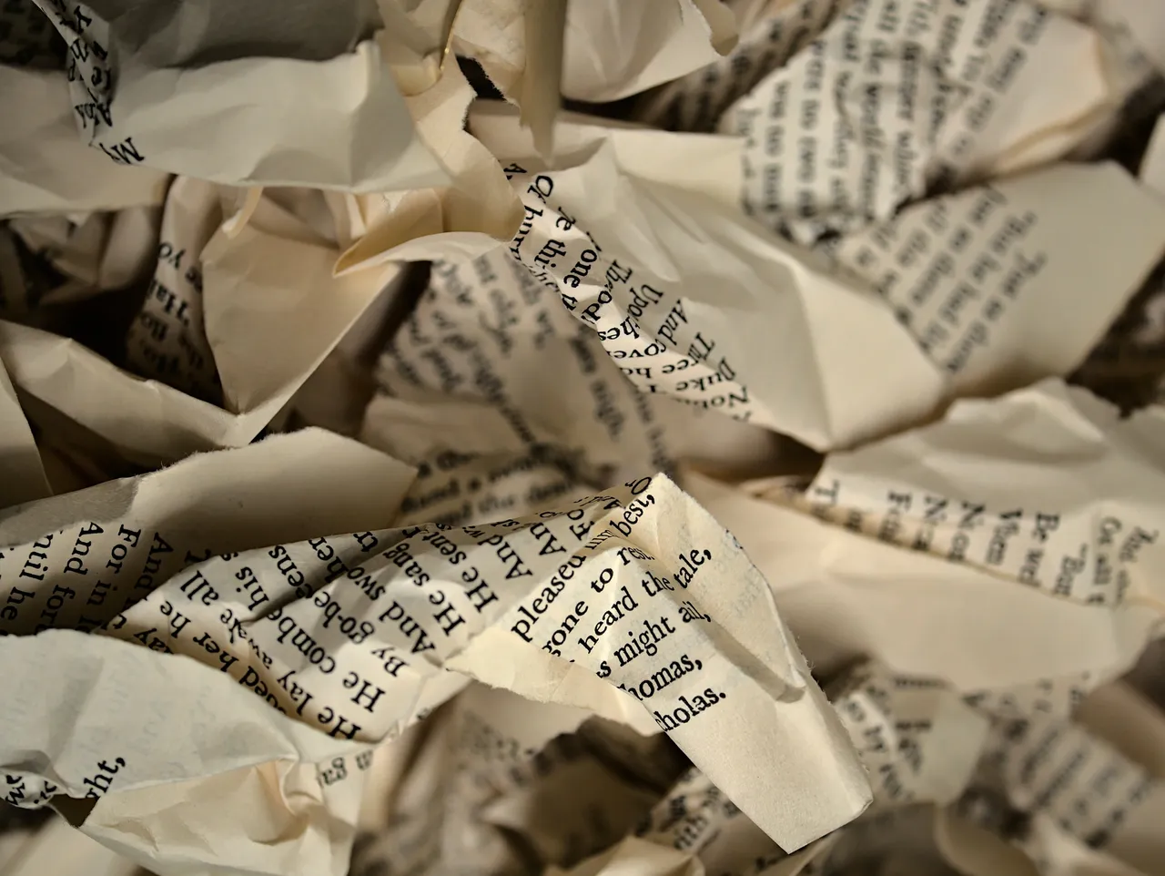 A pile of screwed up and discarded pages