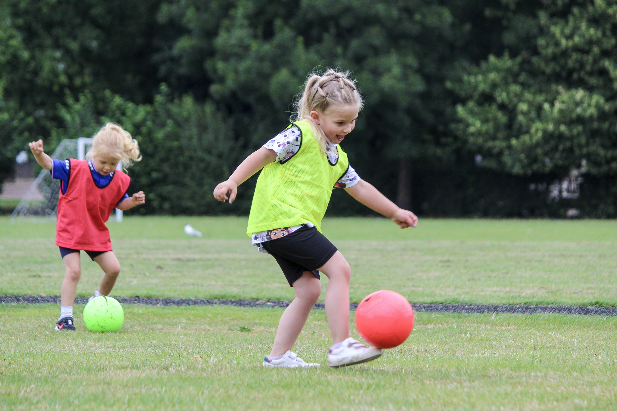 A girl playing football