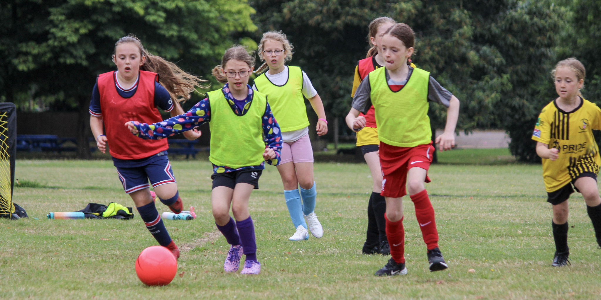 110-IMG_8071 A group of girls playing football at a girls' football camp